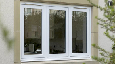 Close up of a locked window with security features